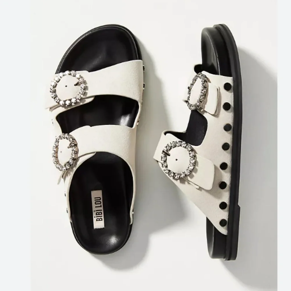 Bibi Lou White Jeweled Buckle Slide Sandals