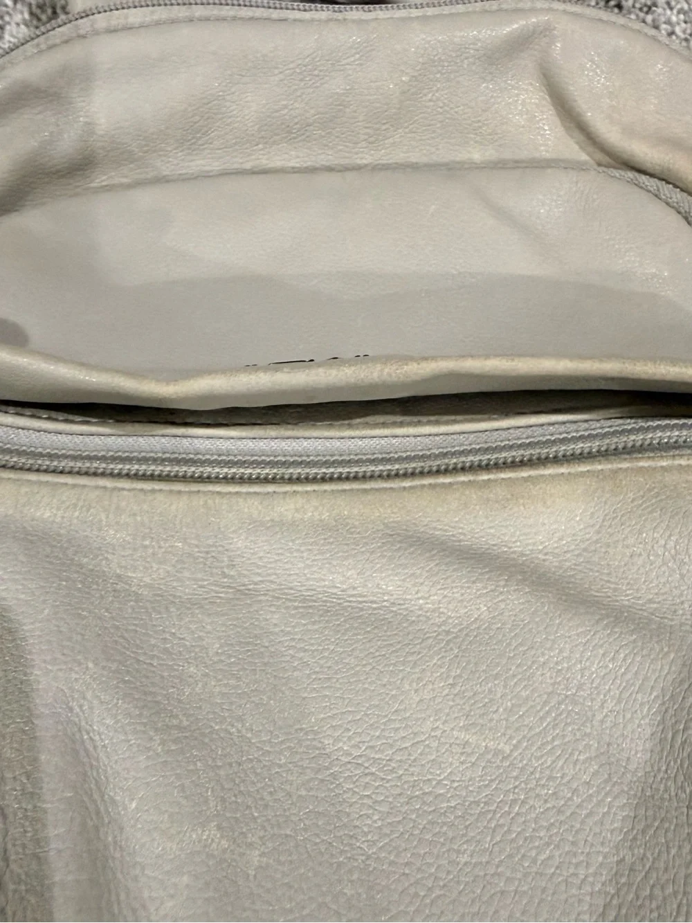 Tumi leather check any