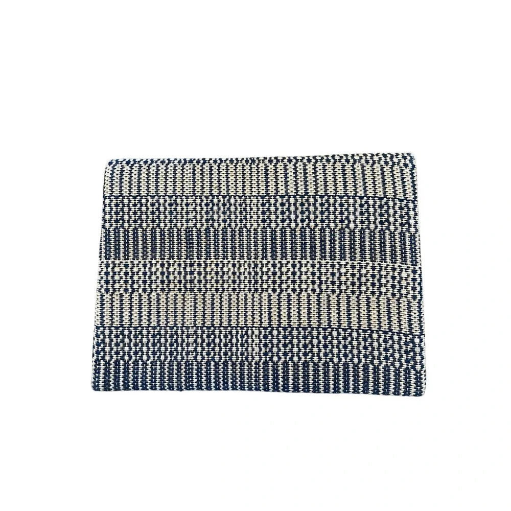 Korissa woven clutch