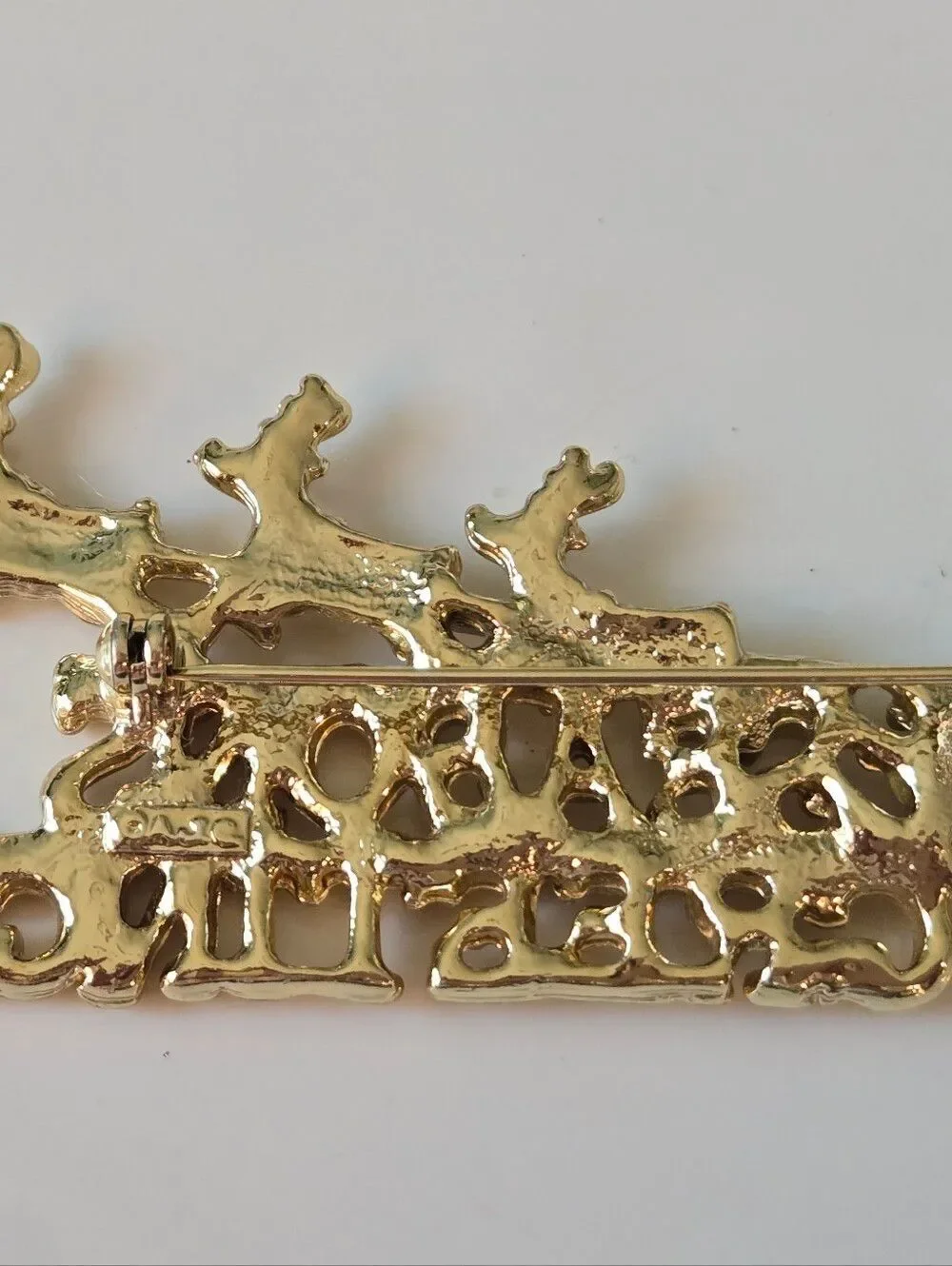 CAJC gold tone