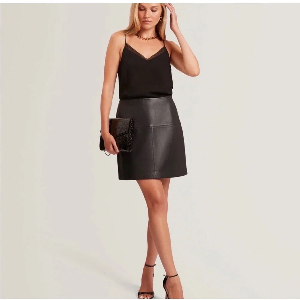 Ted Baker mini polished featuring