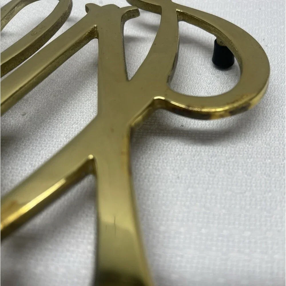 Andrea By Sadek this brass