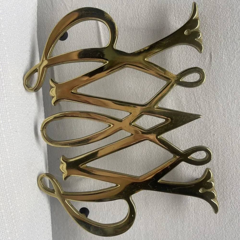 Andrea By Sadek this brass