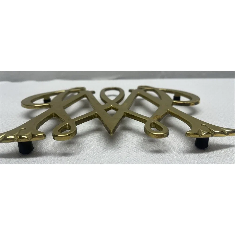 Andrea By Sadek this brass