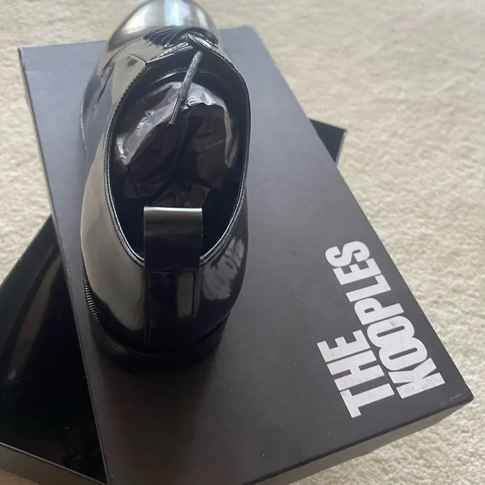 The Kooples sleek polished