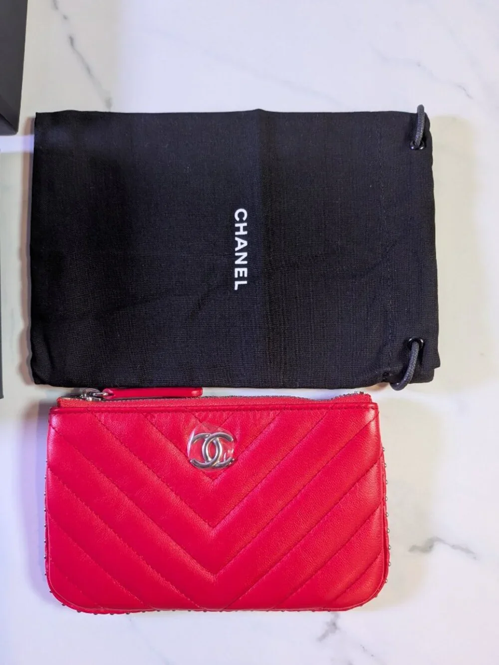 CHANEL Mini O-Case Zip Pouch — Red Chevron Quilted Lambskin, Studded Trim