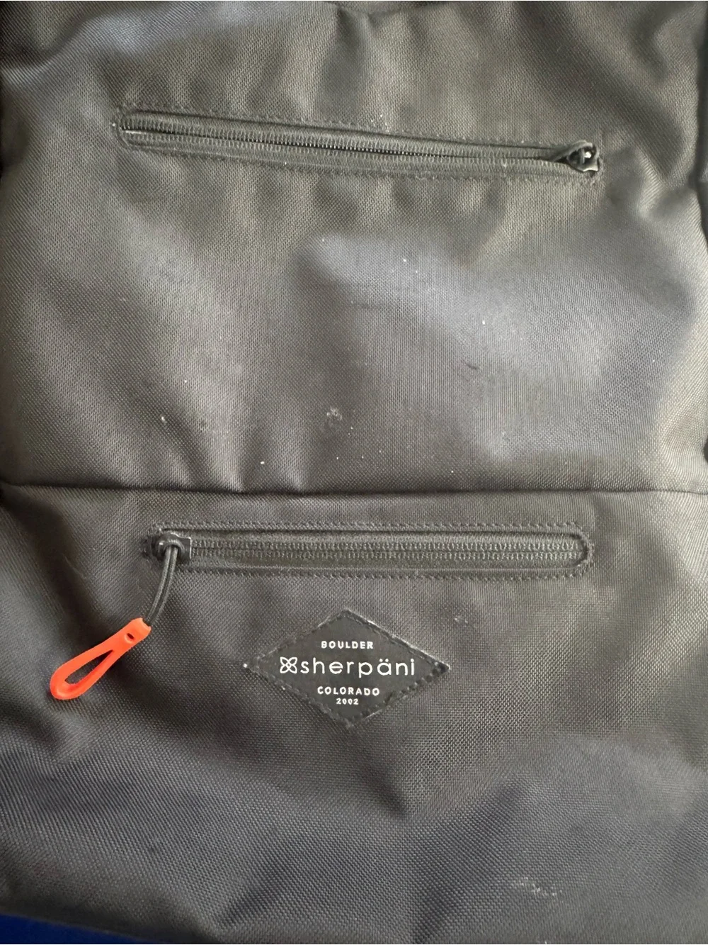 Sherpani Black Backpack with Red Zipper Pull