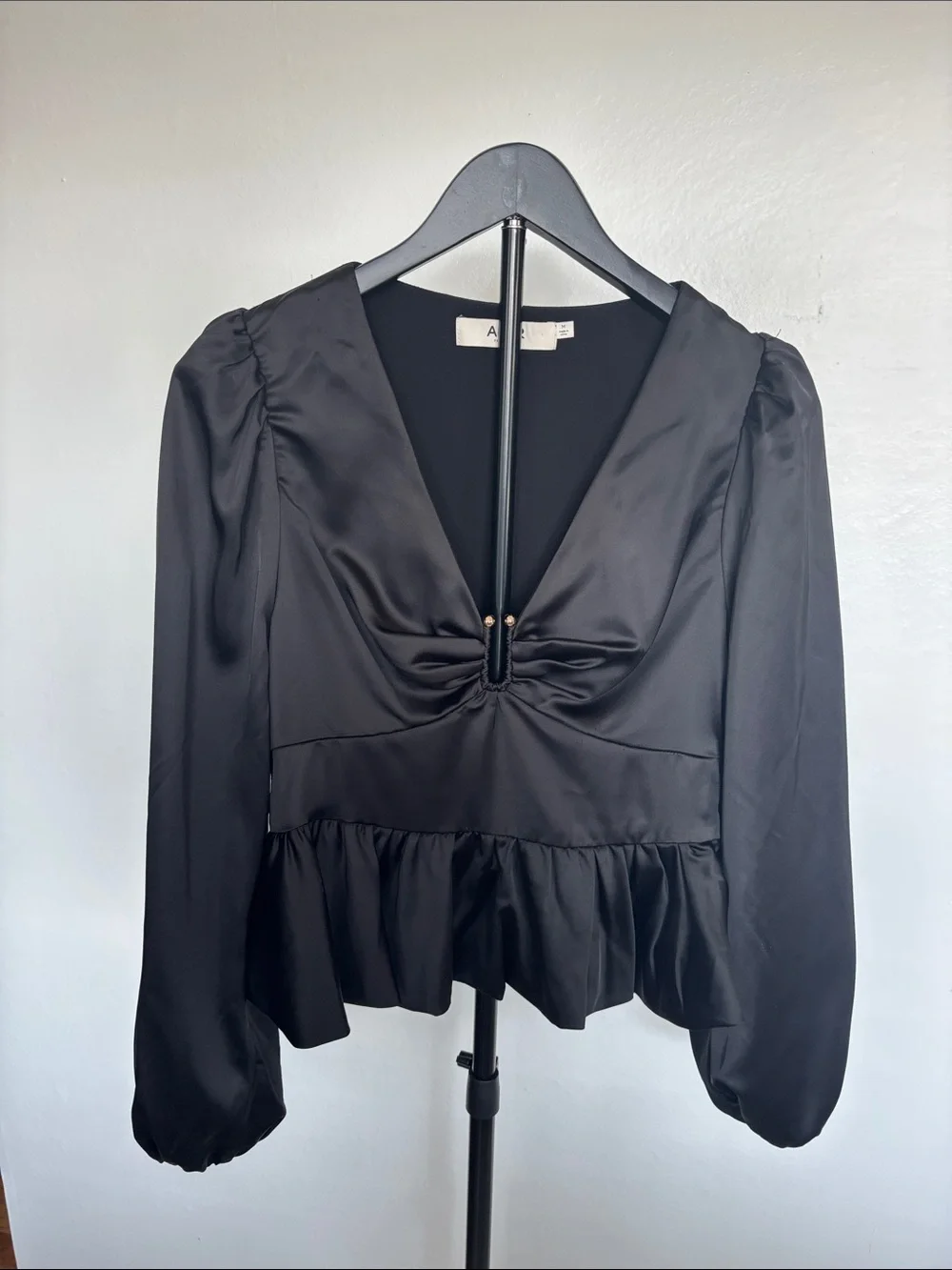 Astr Black Satin V-Neck Peplum Blouse with Puff Sleeves