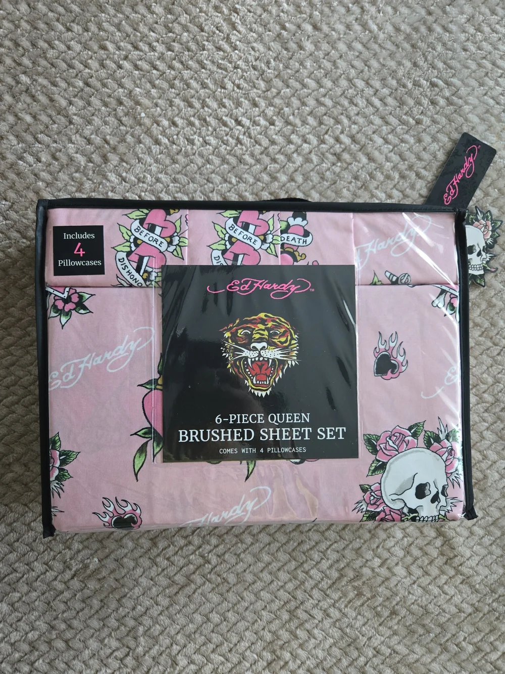 Ed Hardy includes flat