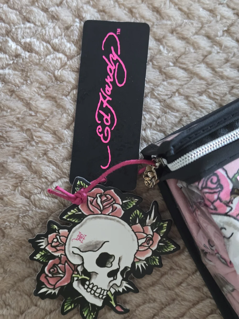 Ed Hardy includes flat