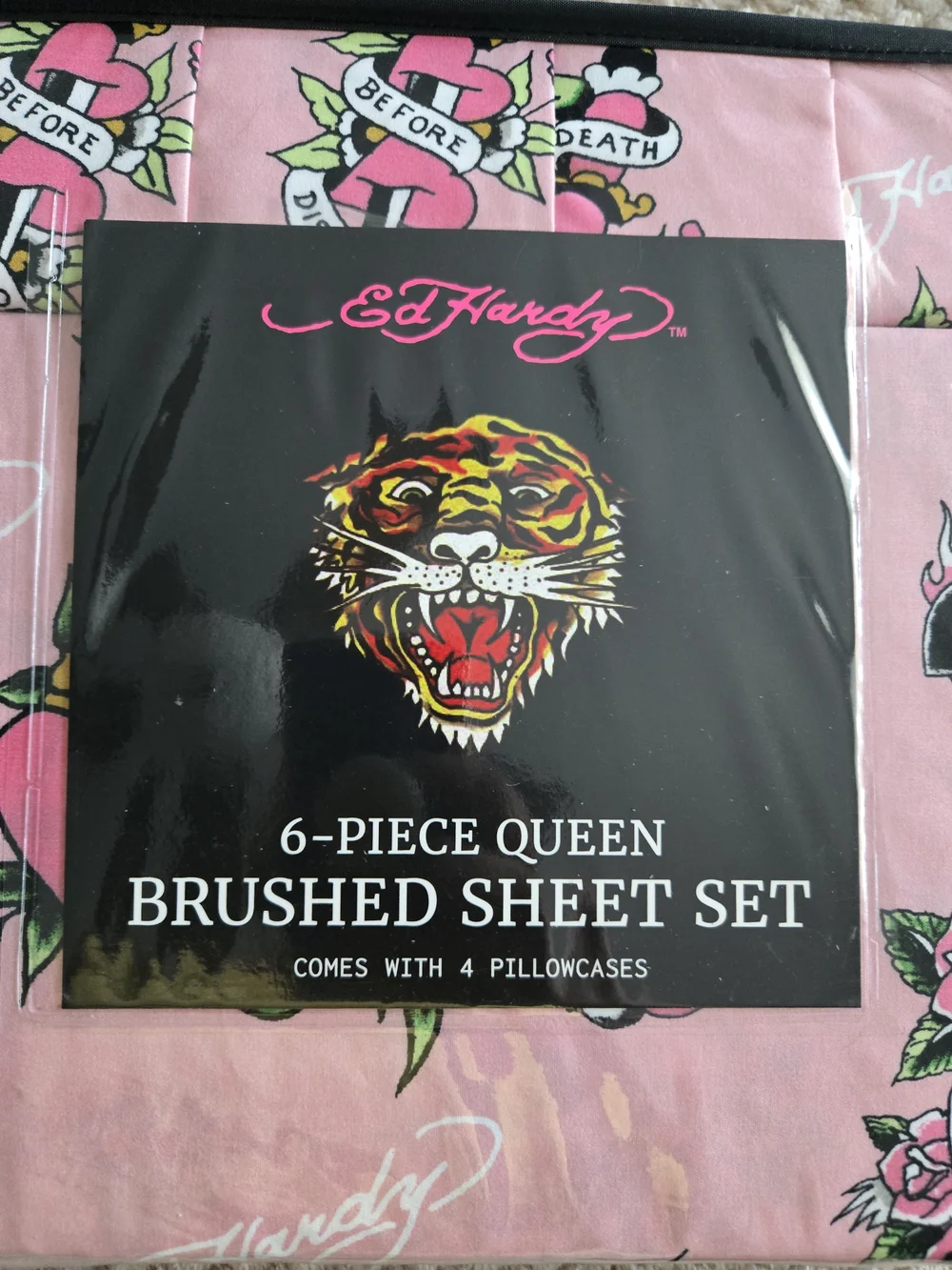 Ed Hardy includes flat