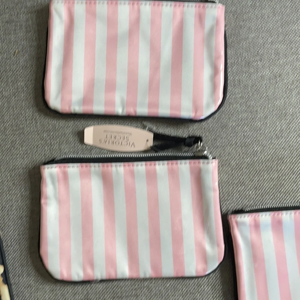 Victoria’s Secret pink and white signature stripe‎ pouches