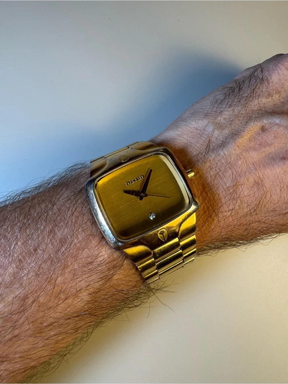 Nixon watch stainless position