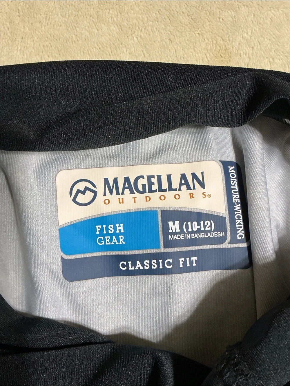 Magellan Outdoors logo rashguard