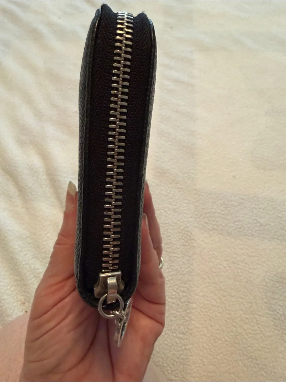 Bvlgari Zip-Around Black Leather wallet with blue interior.