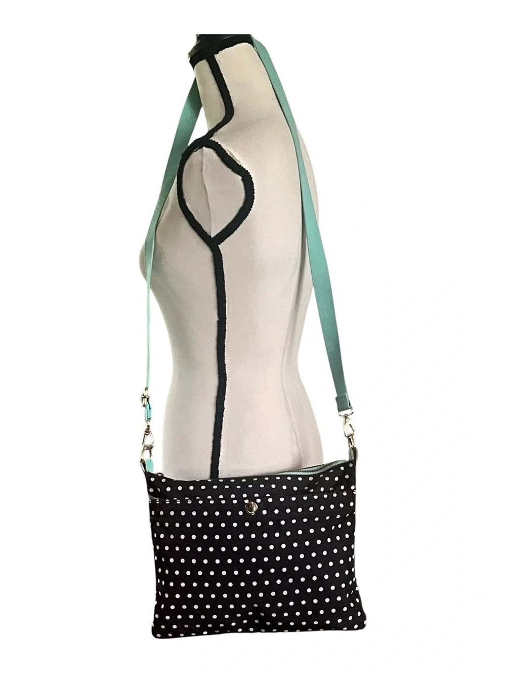 Fossil Keyper polka dot crossbody with mint aqua adjustable strap.