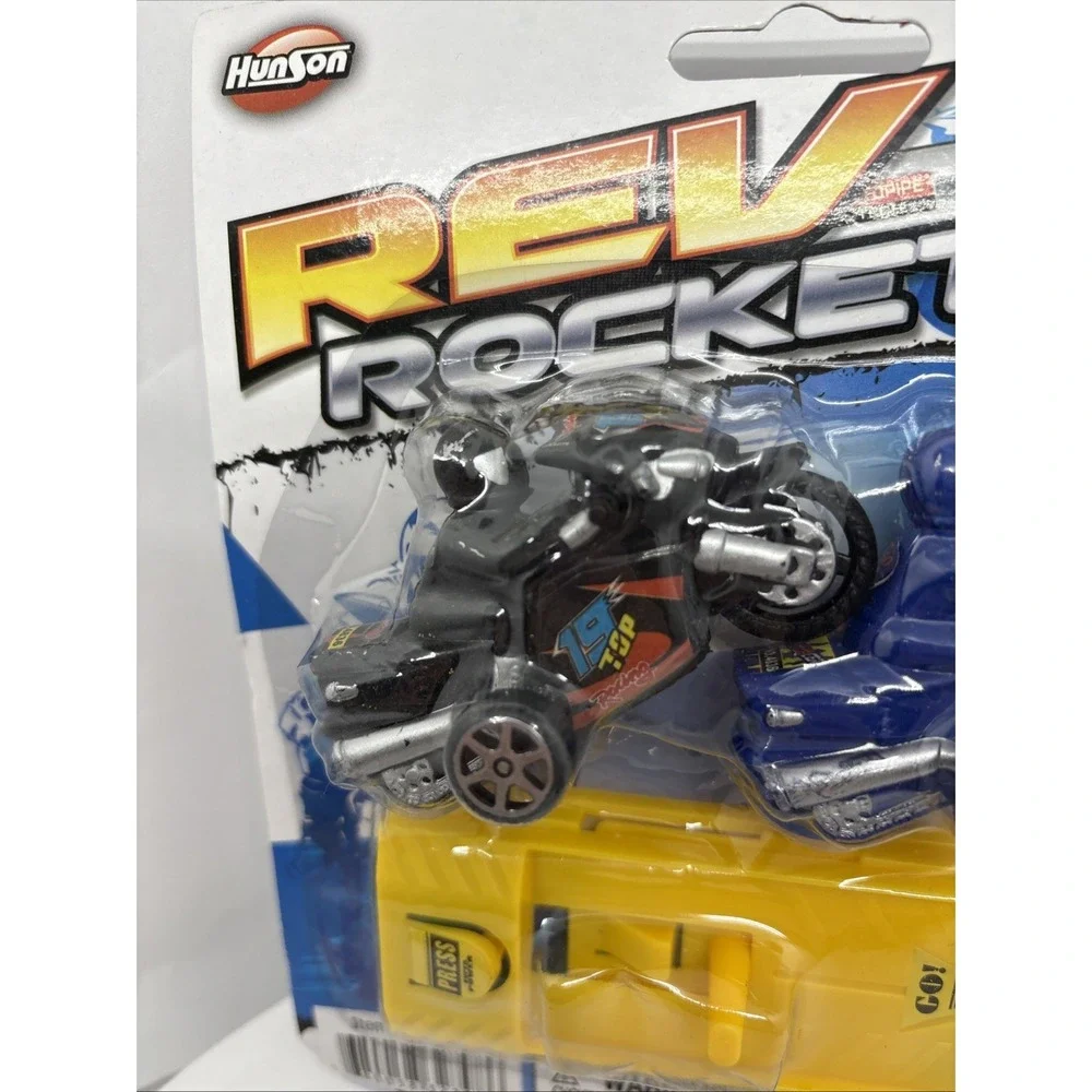 New Rev Rockets Motorcycles Press And Go Plastic Toys Motorcycle with Launch Pad