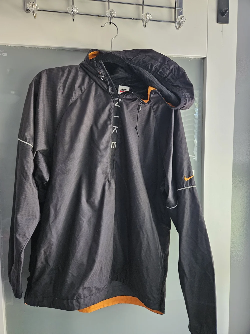 Nike Black Windbreaker Jacket with Orange Accents