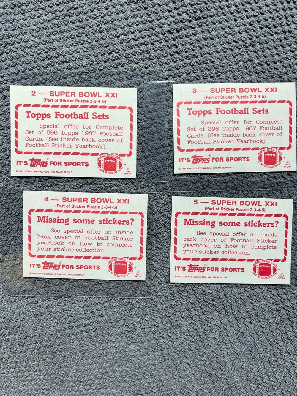 1987 4 Topps stickers (#2-3-4-5) celebrating Super Bowl XXI (Phil Simms, Oates,