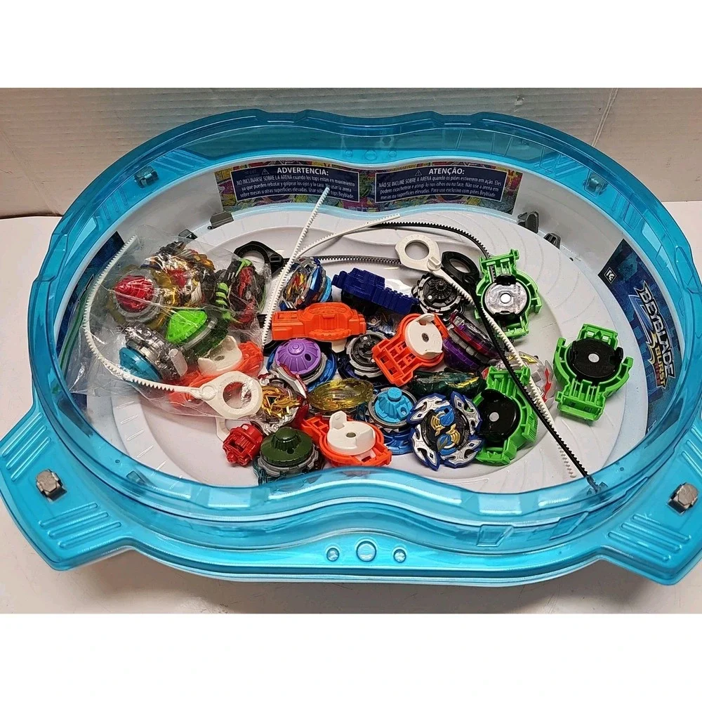 Beyblade Lot With Beyblades, Arena, And Rippers..plastic And Metal