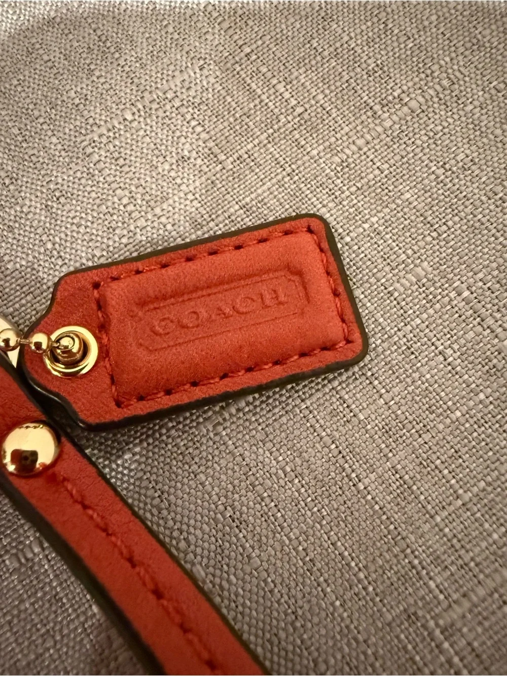 Coach hardware wristlet plaque