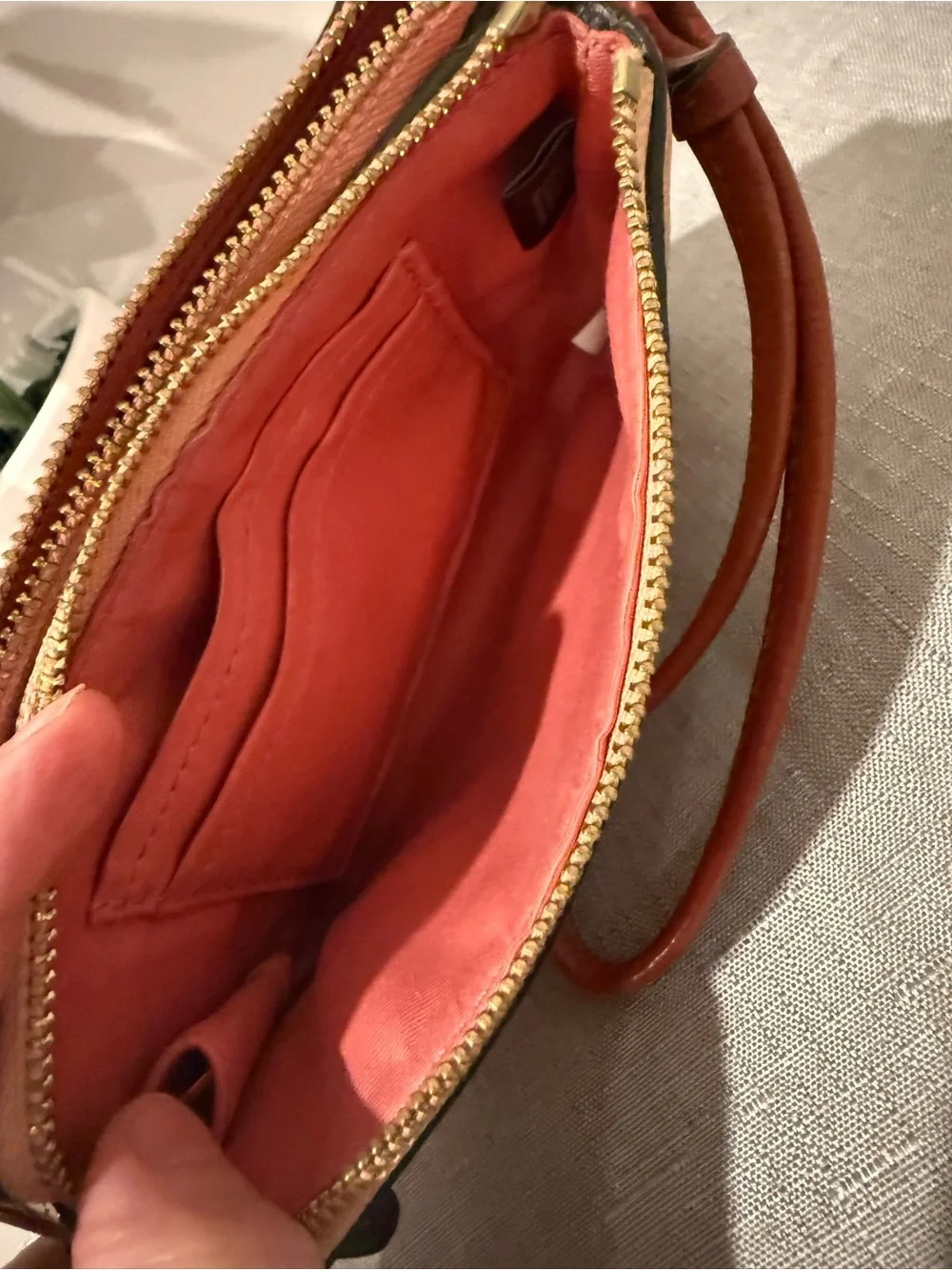 Coach Pink and Peach Two Tone Pebbled Leather Wristlet with Tan Strap
