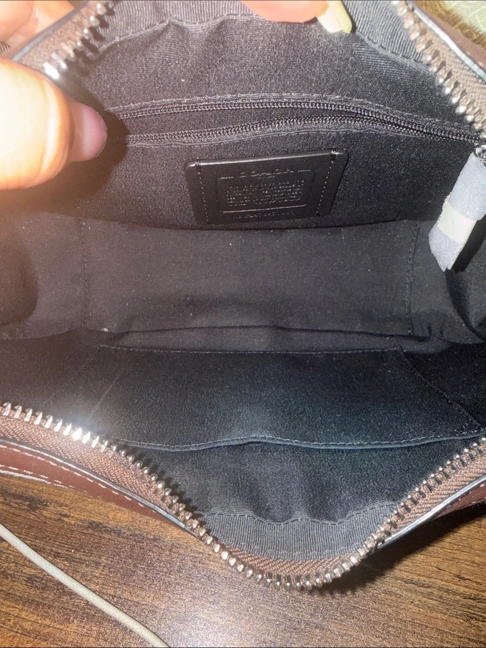 Coach iconic signature