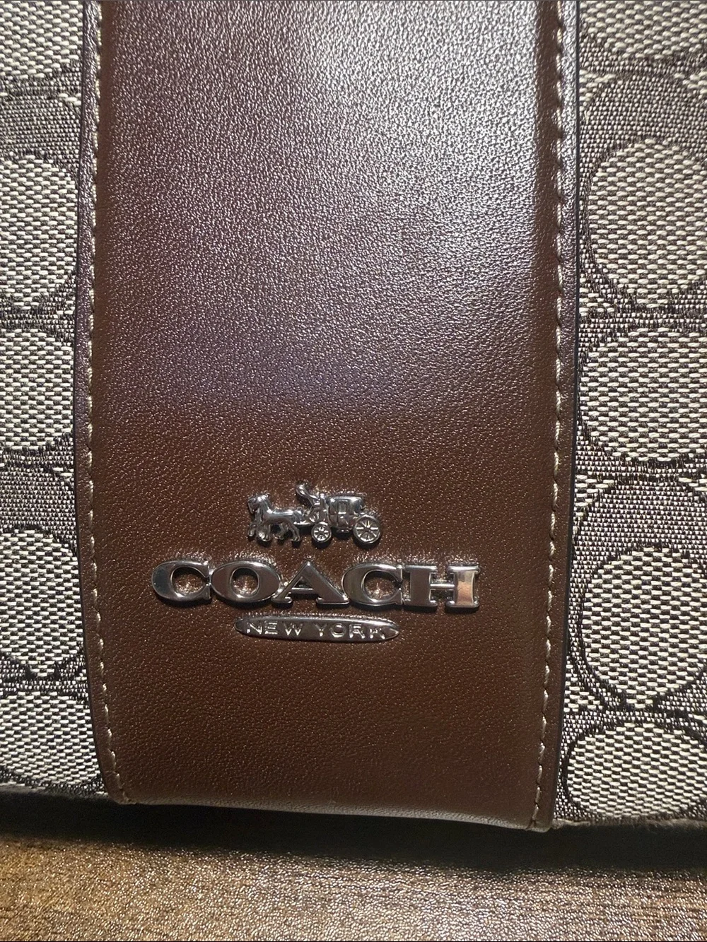 Coach iconic signature