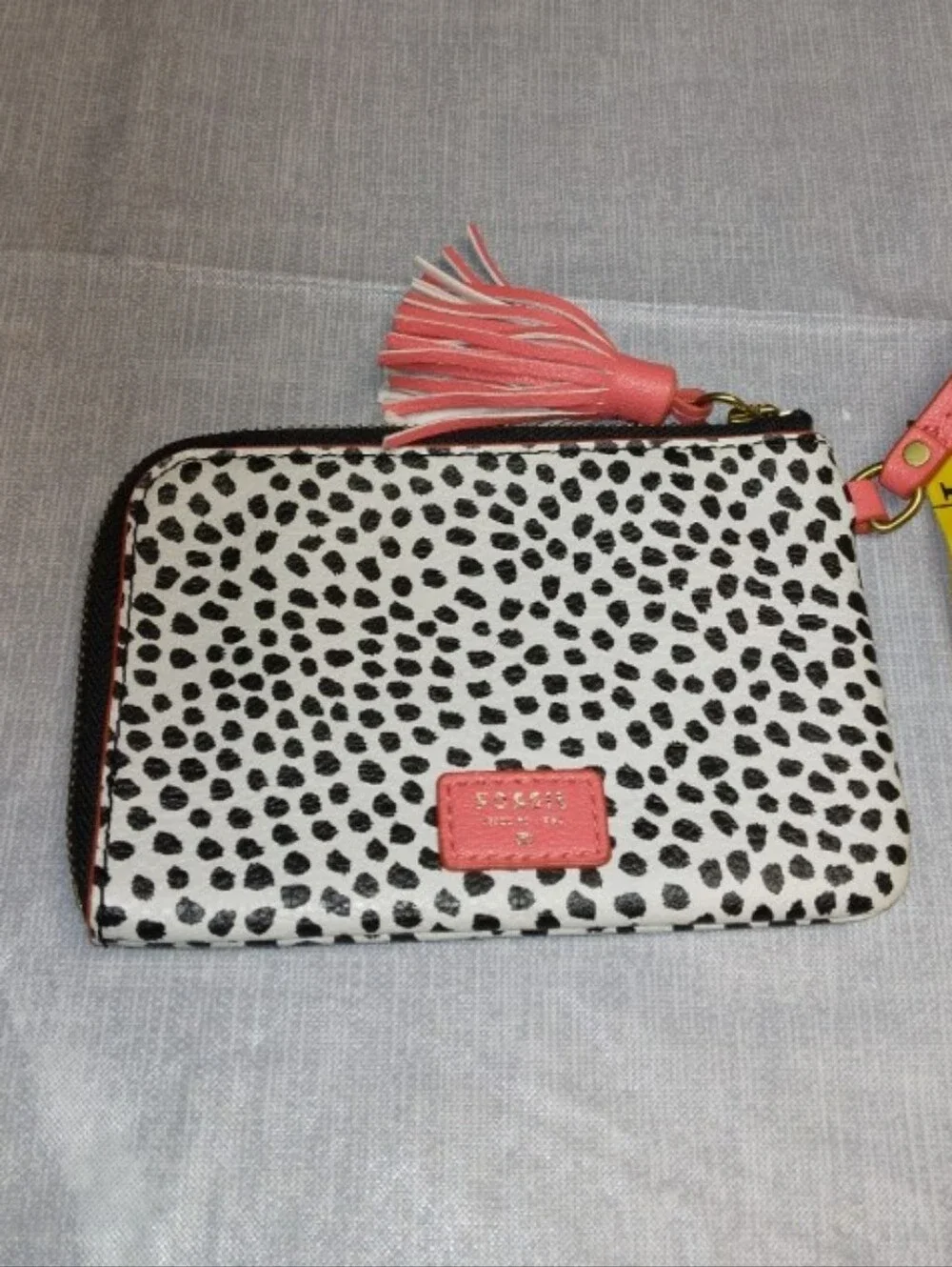 Fossil Black & White Spotted Wristlet with Coral Accents