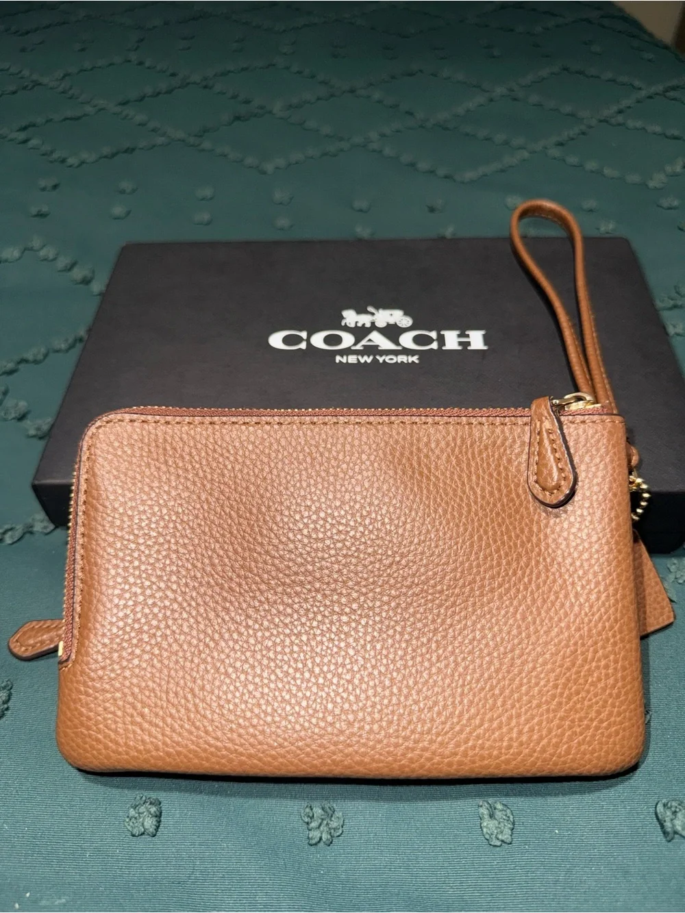 COACH Pebbled Leather Wristlet in Cognac Brown