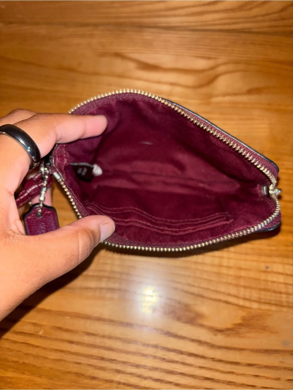 Coach Burgundy Pebbled Leather Wristlet with Gold Logo