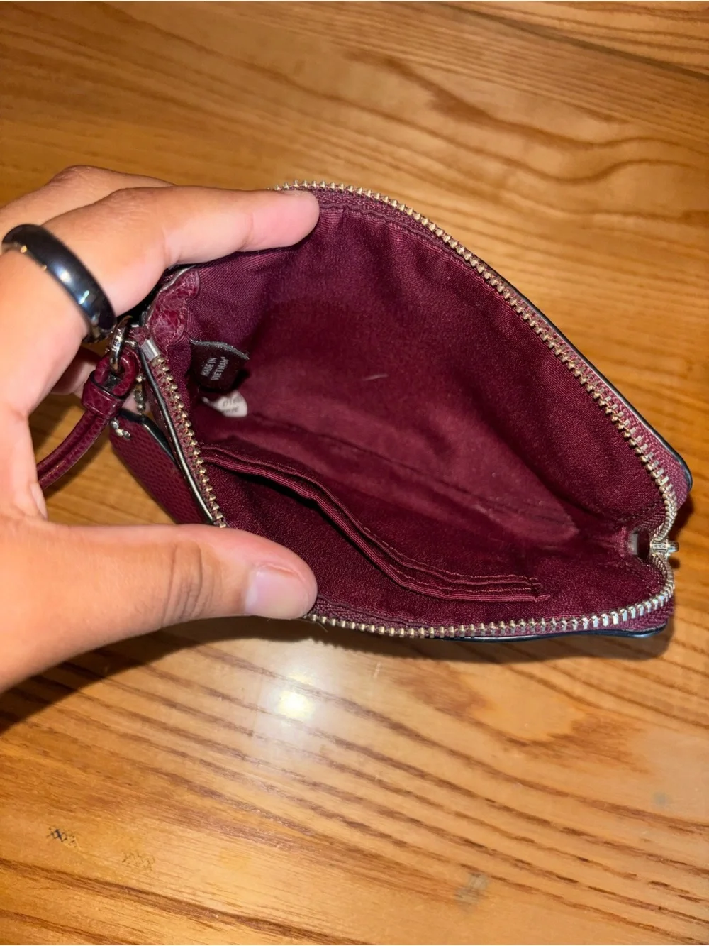 Coach Burgundy Pebbled Leather Wristlet with Gold Logo