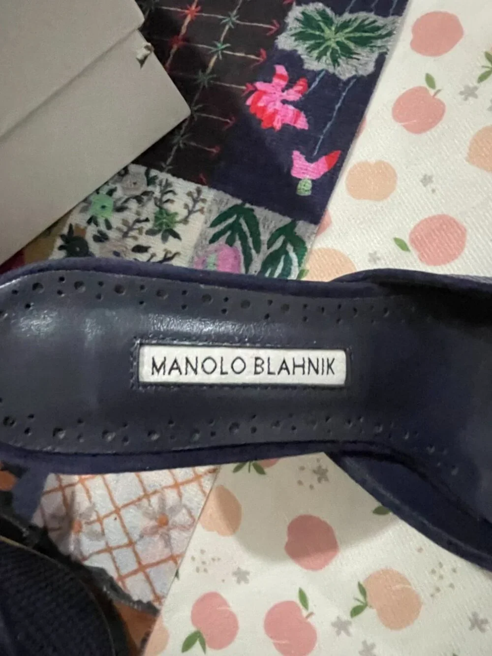 Manolo Blahnik mules buckle