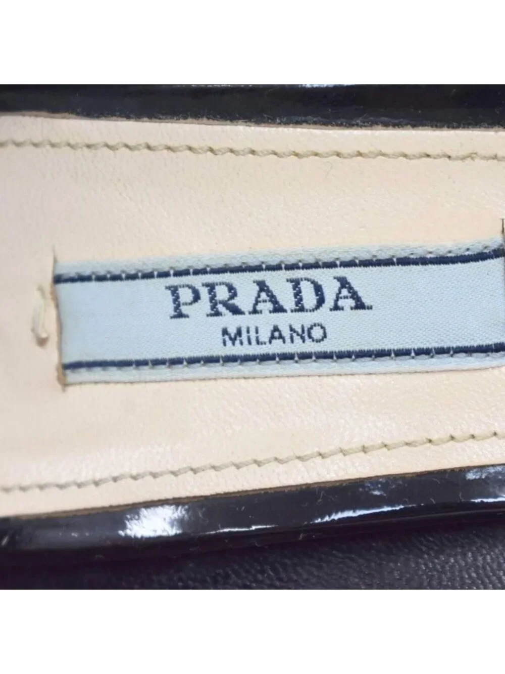 Prada name enamel