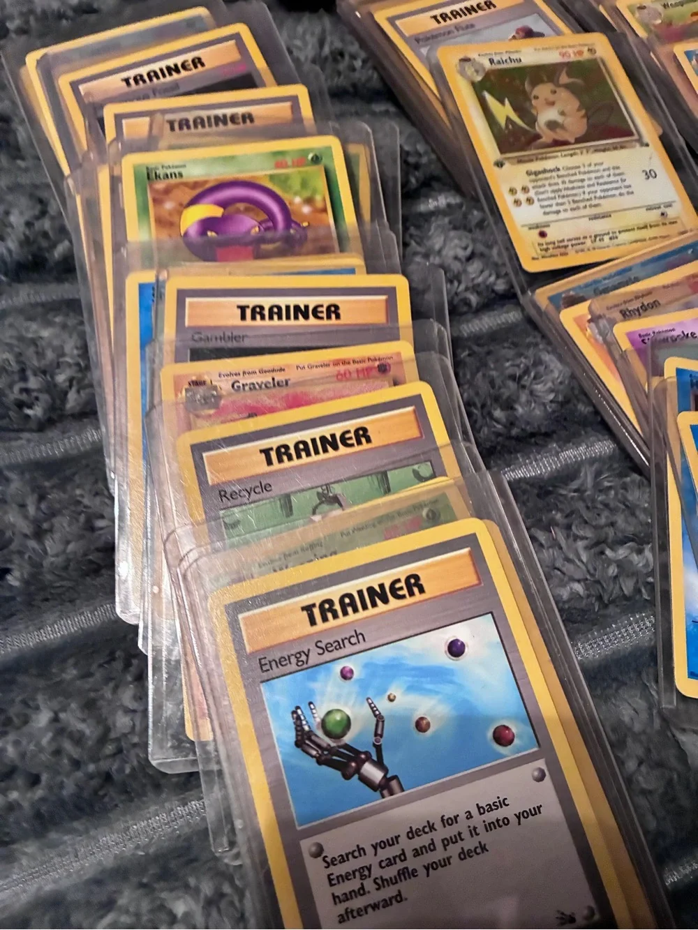 Pokemon Trading Card Lot - Assorted Colors 1997-98 trading cards in plastic hold