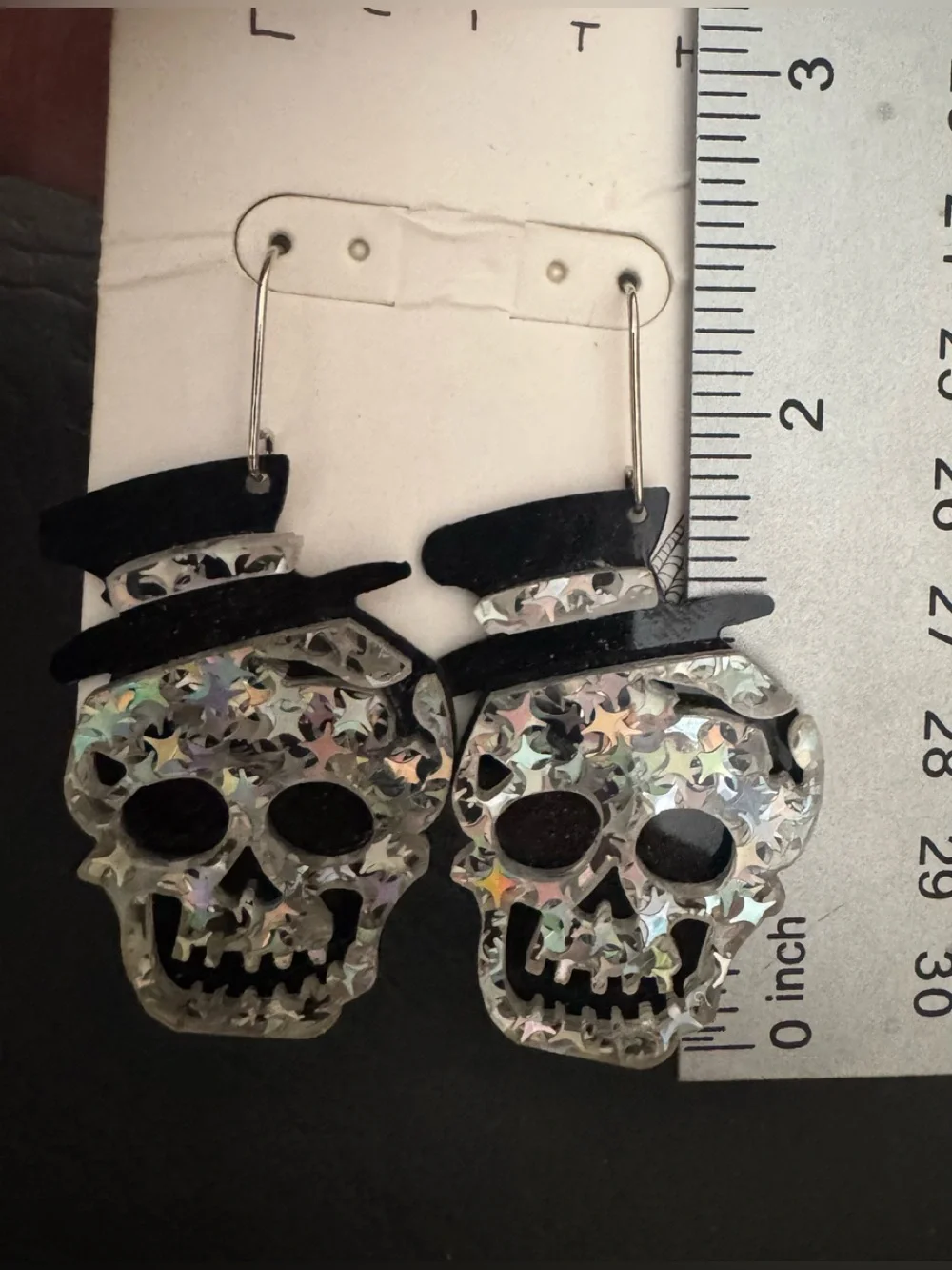 New Leith iridescent skull earrings