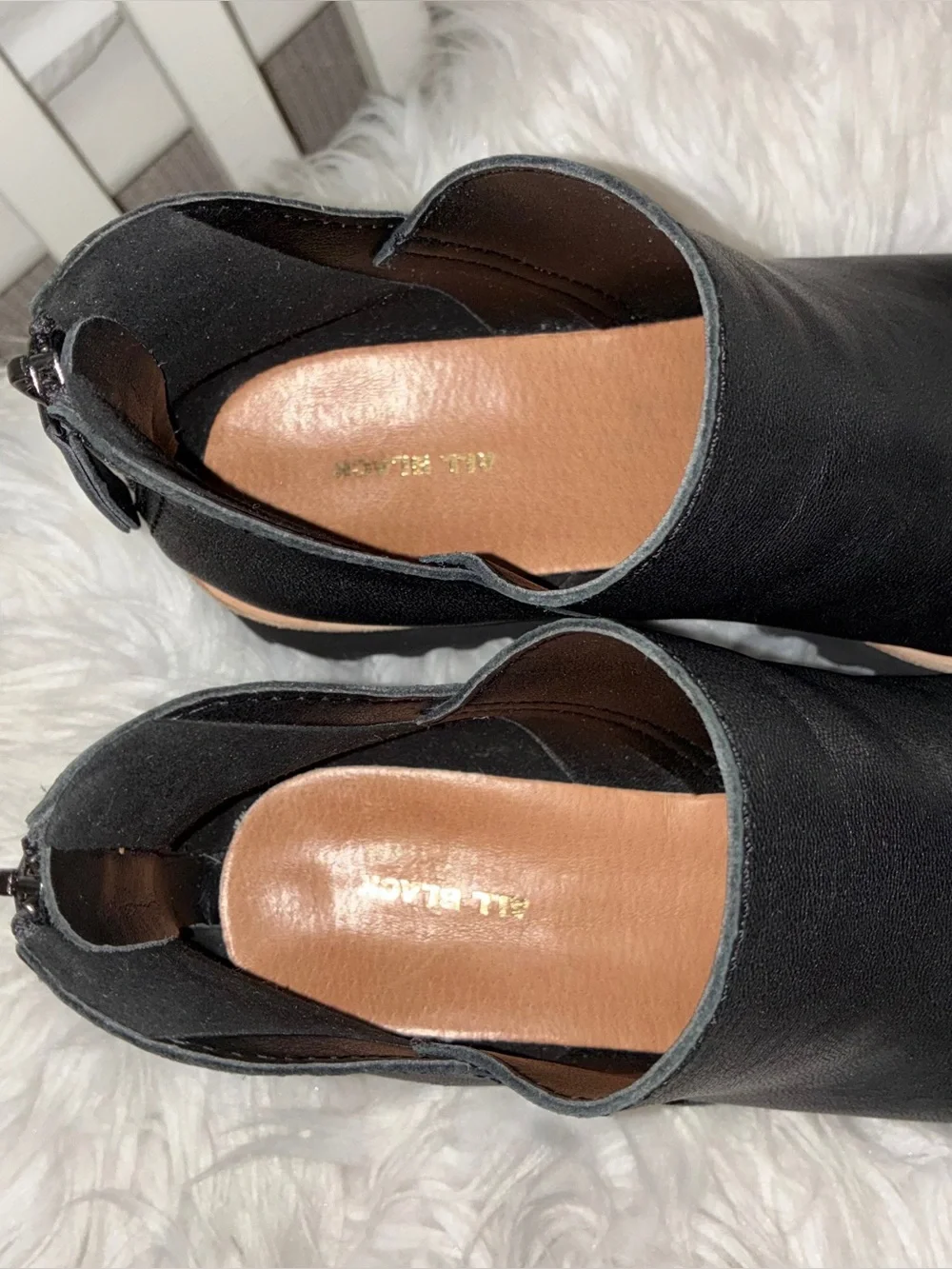 All Black contemporary platform