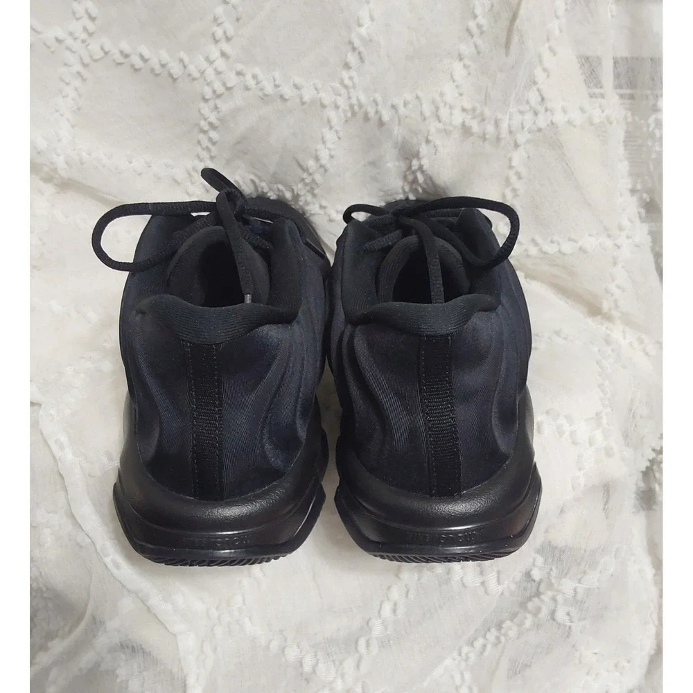 Nike Giannis Immortality 4 basketball shoes in a triple black