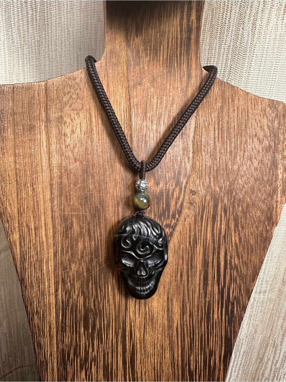 Unique Blue and Golden Tiger’s Eye Skull Carving Pendant Necklace on Brown