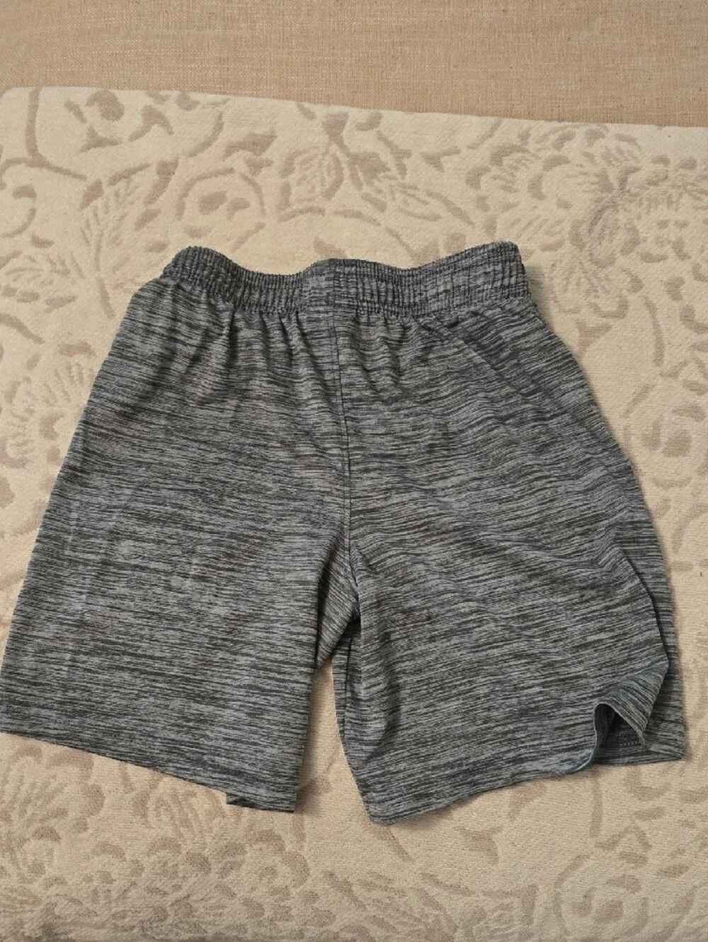 Under Armour Kid’s Gray Heather Athletic Shorts with Orange Logo Accent