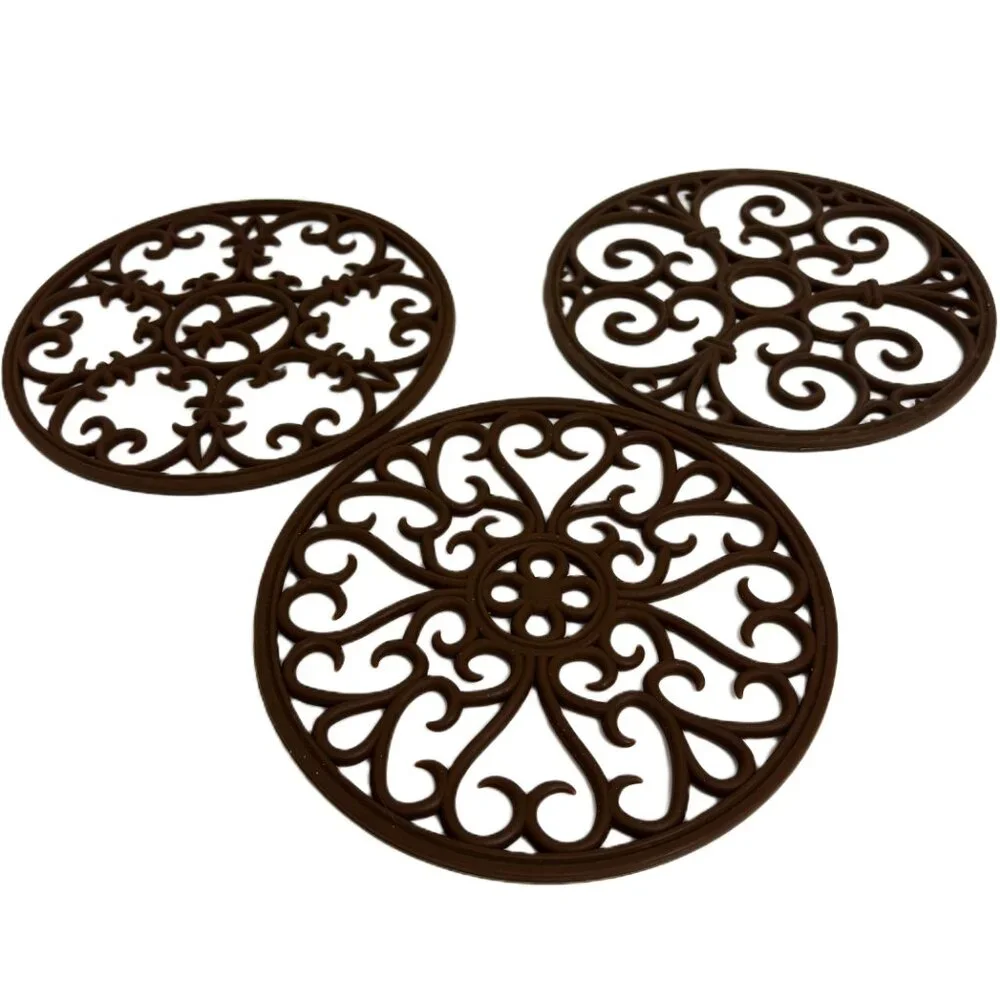 Source Unknown trivets set