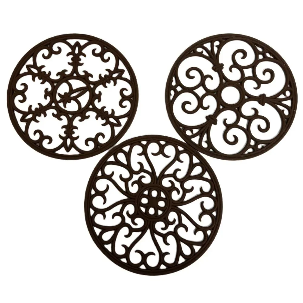 Source Unknown trivets set