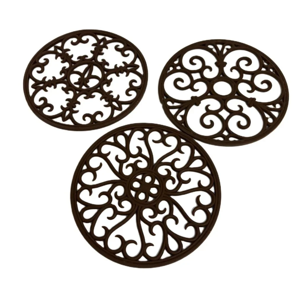 Source Unknown trivets set