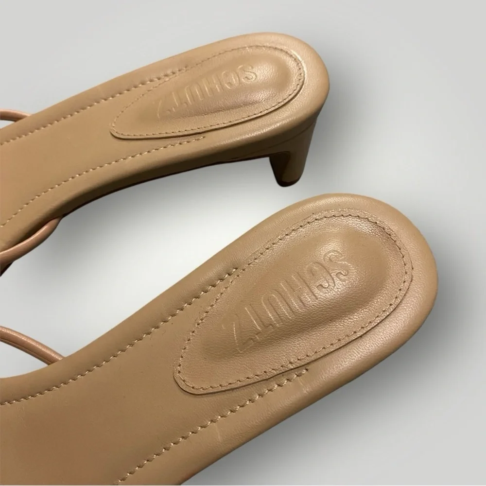 SCHUTZ featuring open