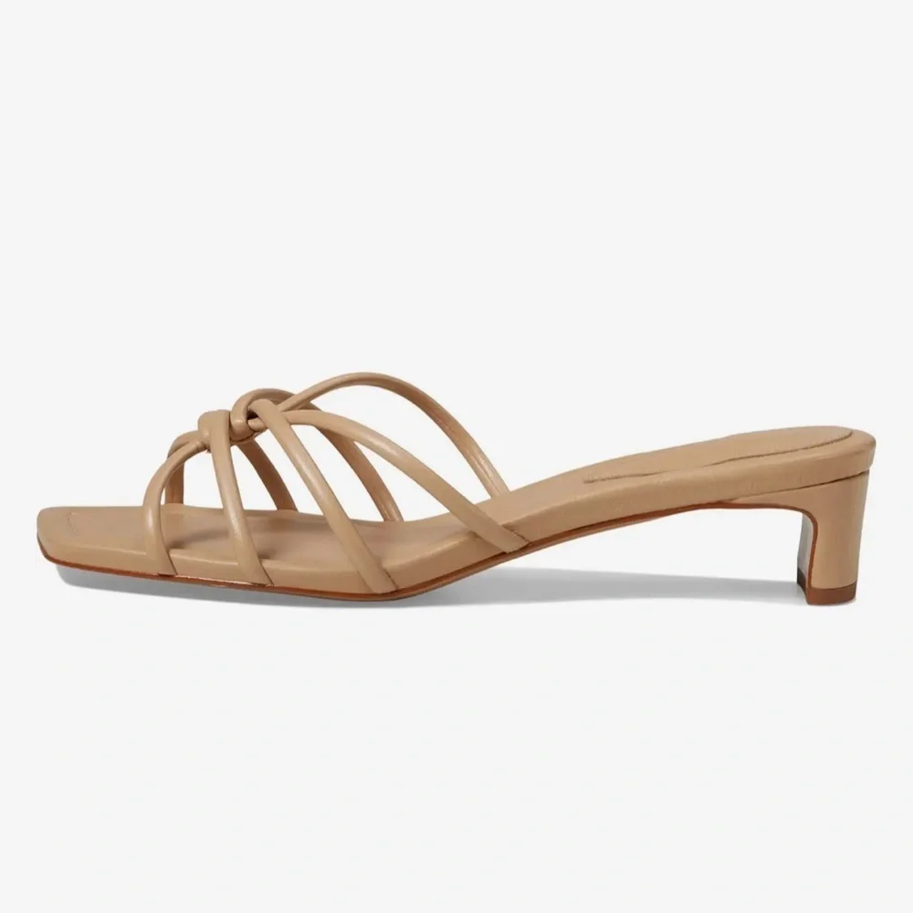 SCHUTZ featuring open