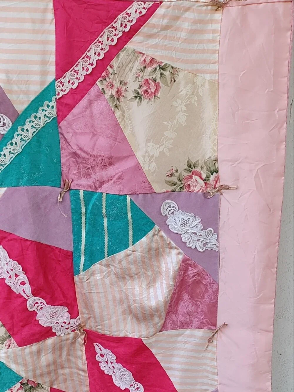 Hand Crafted satiny ribbon features