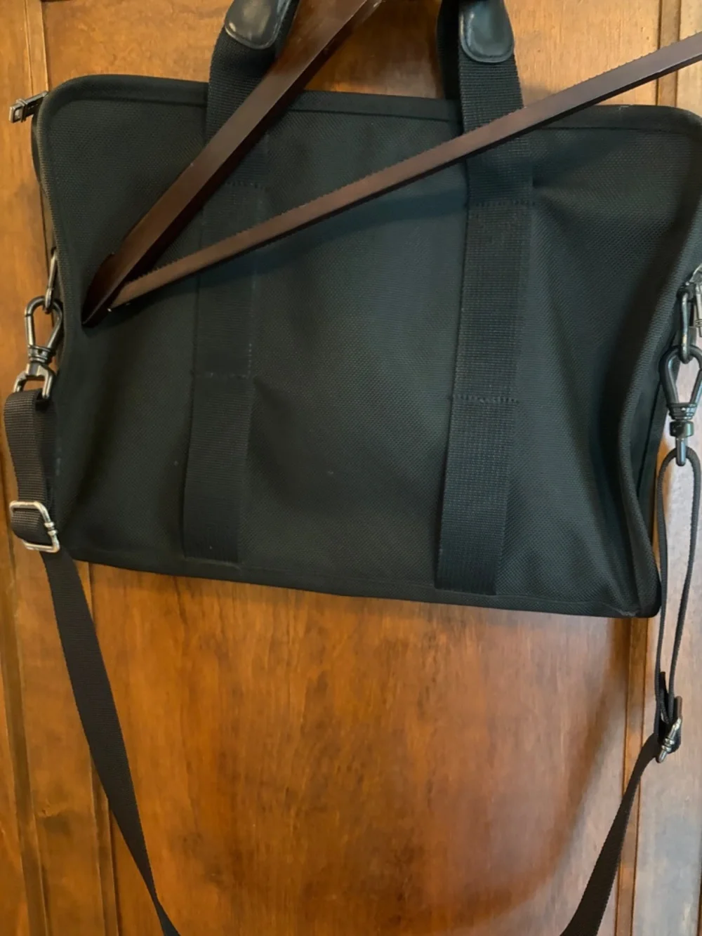 Tumi lots pockets