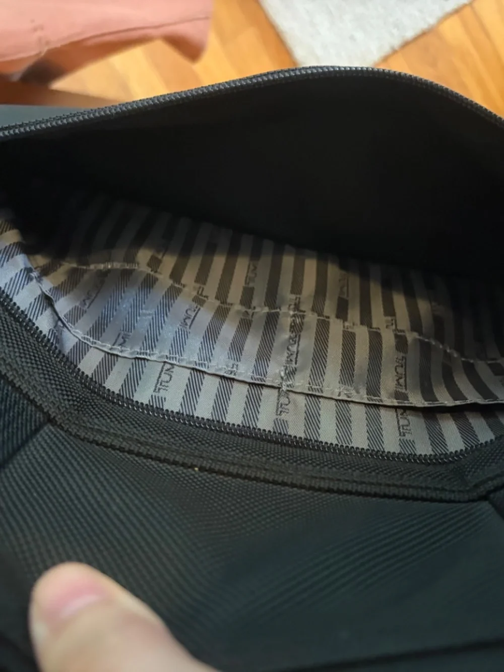 Tumi lots pockets