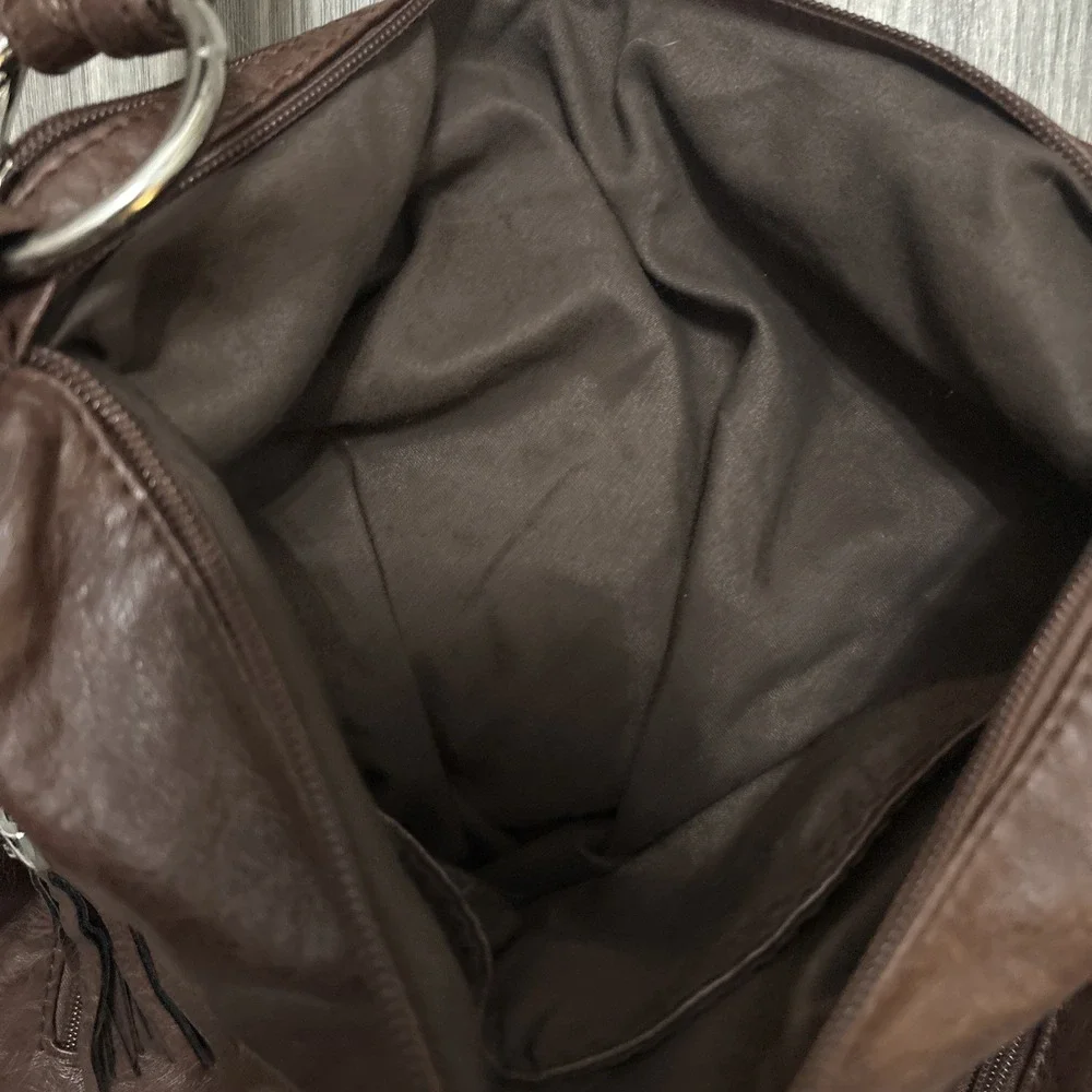 Unlnown dark brown