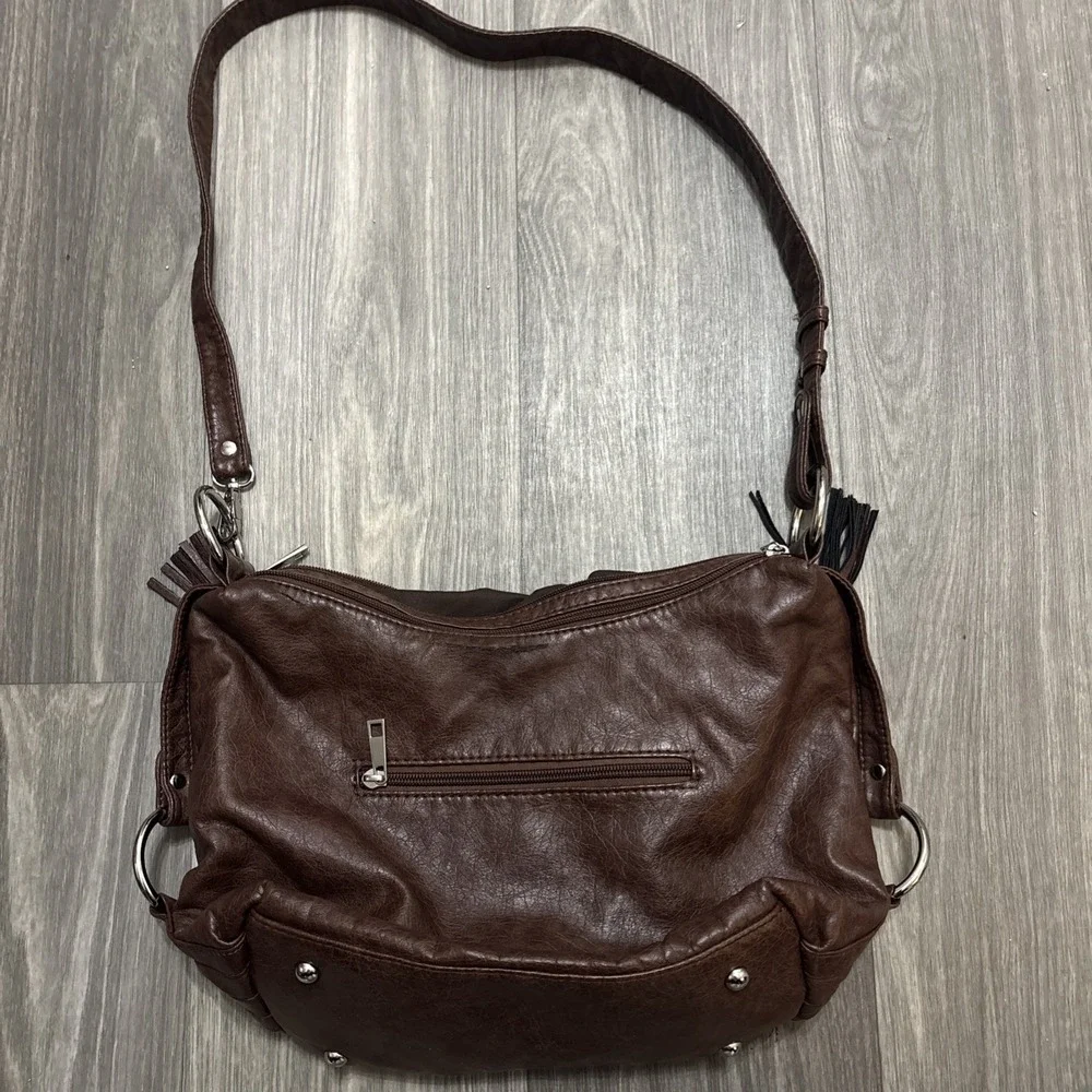 Unlnown dark brown